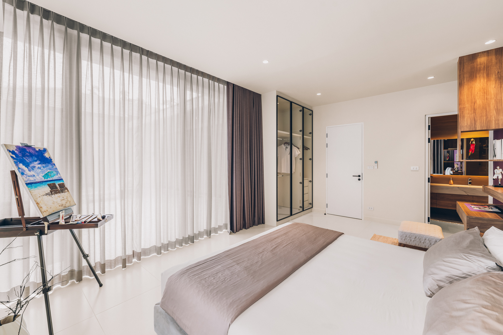 Guest Suite with Garden Terrace Access — Light-filled guest bedroom featuring full-height sliding glass doors to the outer terrace (Photo #15)