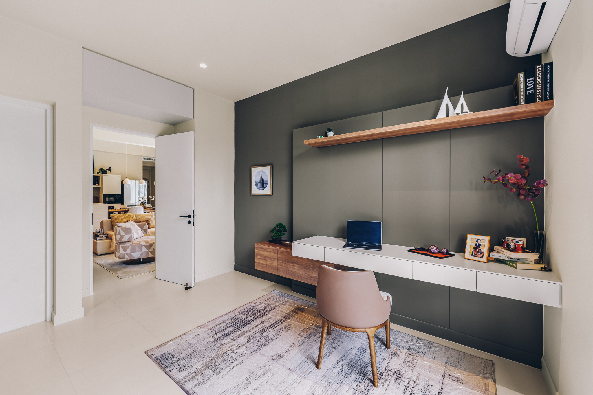 Main Living & Dining Perspective — Expansive ceramic-tiled living heart looking toward the entrance foyer and private bedroom wing (Photo #03)