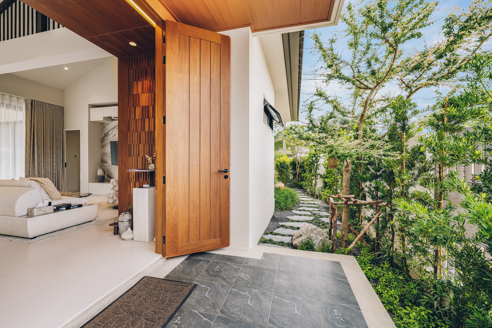 Entrance Foyer & Double Timber Doors — Warm natural timber double entry doors welcoming residents into the main living heart (Photo #40)